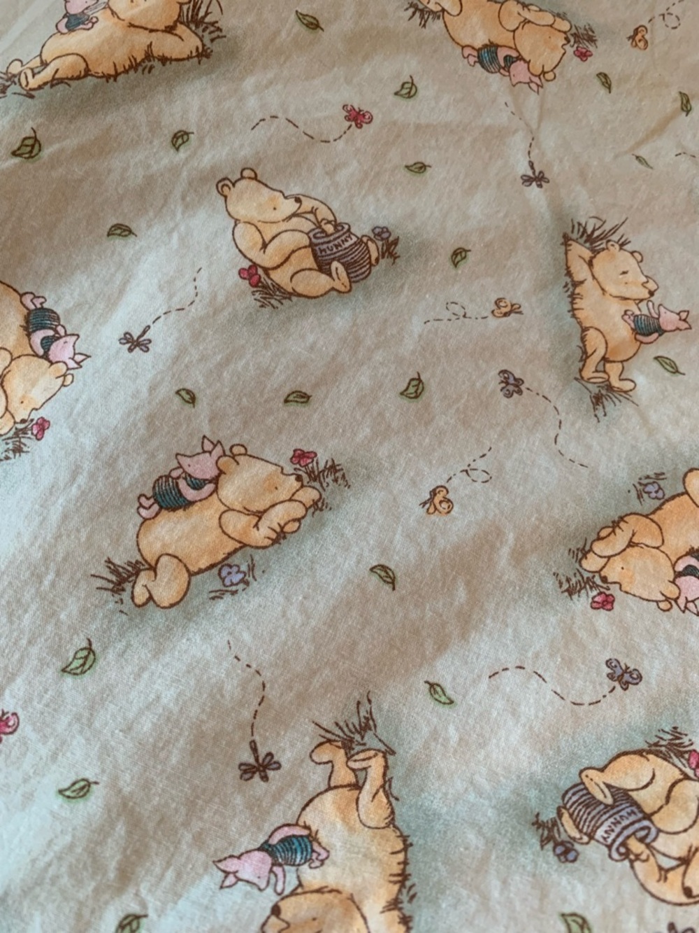 Disney Classic Winnie the Pooh & Friends Fitted Crib Sheet in Light Green